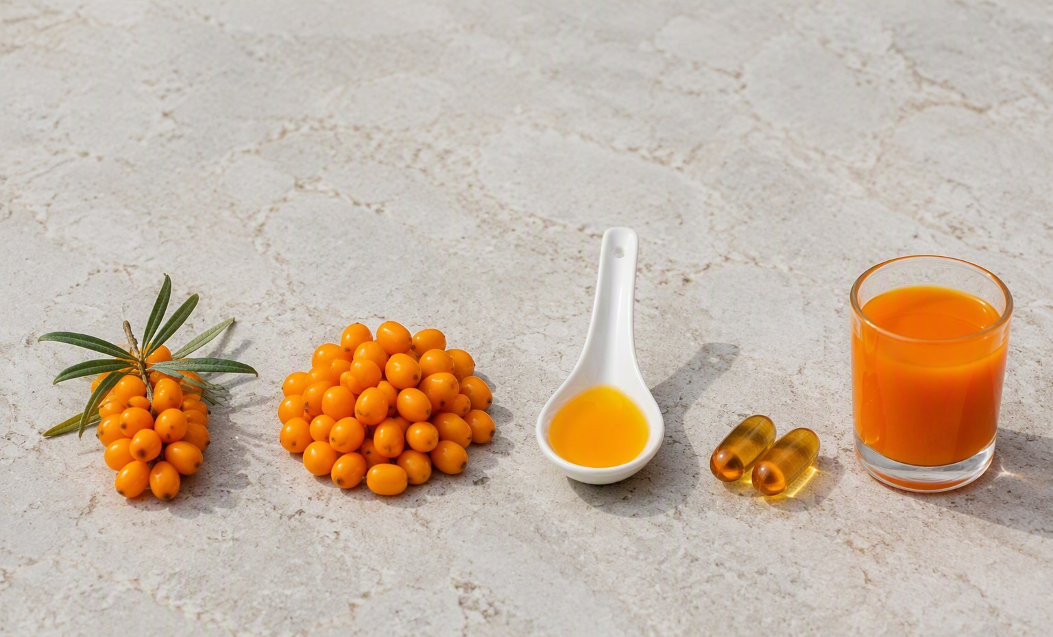 Daily sea buckthorn amounts in a row: oil, two softgels, and a small glass of juice