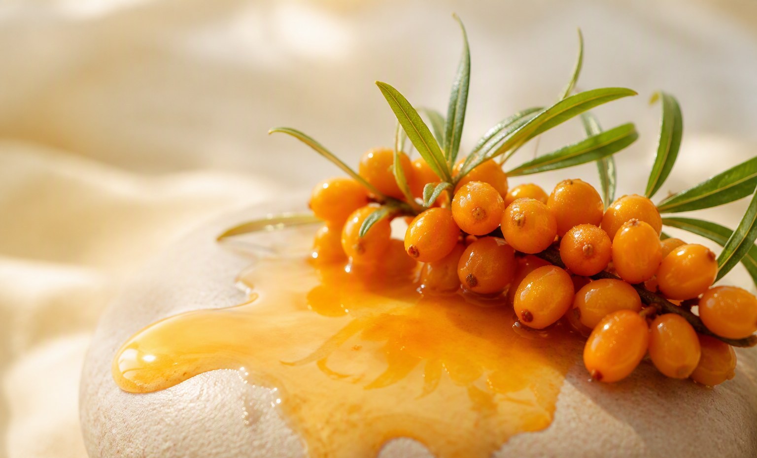A pool of orange sea buckthorn oil with fresh berries, a rich hydration treatment